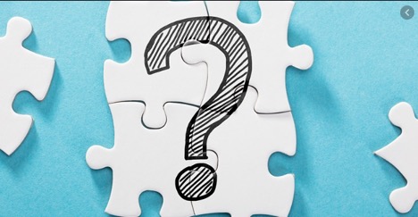 puzzle pieces with question mark on them