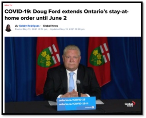 Premier Doug Ford sitting at a microphone