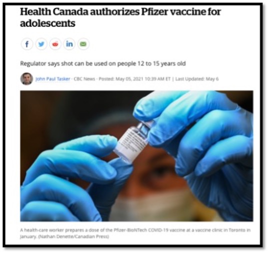 two gloved hands holding a vaccine bottle