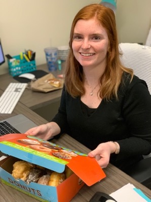Photo of Karley with donuts