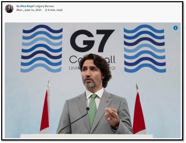 prime minister Trudeau standing at a podium at G& meeting