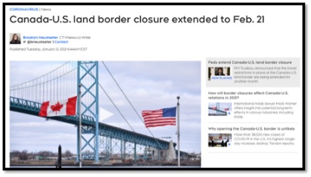 Land border bridge with Canada and USA flags in forefront