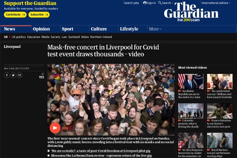 photo of maskless group of people in Liverpool attending a concert