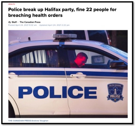 police man sitting in police cruiser