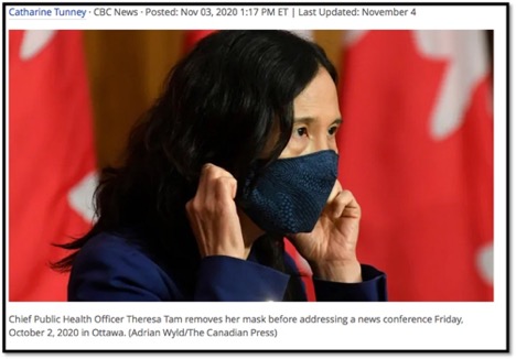 Dr Tam wearing a mask