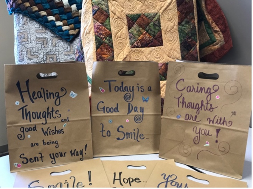 paper bags with healing thoughts written on them