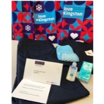 socks hand sanitizer scrubs Kleenex and note from KHSC