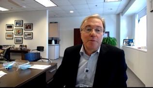 zoom screenshot of Dr. Pichora sitting at a desk in his office