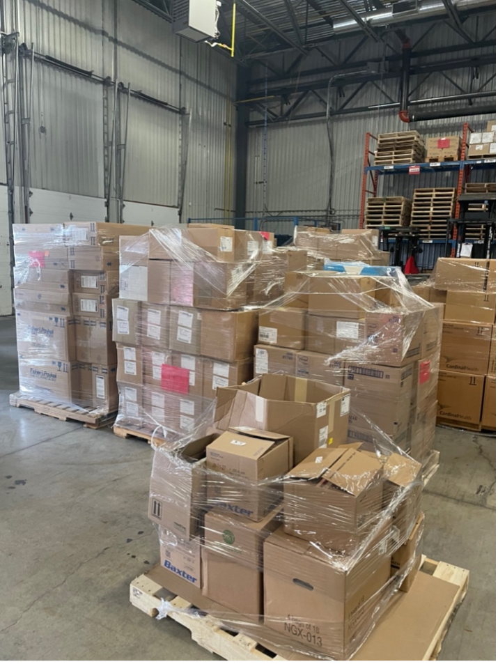 boxes on skids in a warehouse
