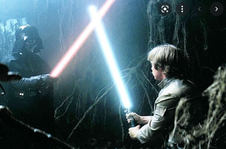 Luke Skywalker and Darth Vader fighting with light sabers
