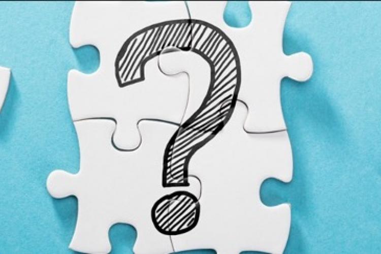 puzzle pieces with question mark on them