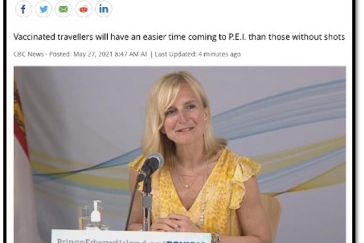 PEI health minister at a microphone