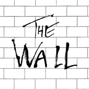 The Wall text on a background of a brick wall